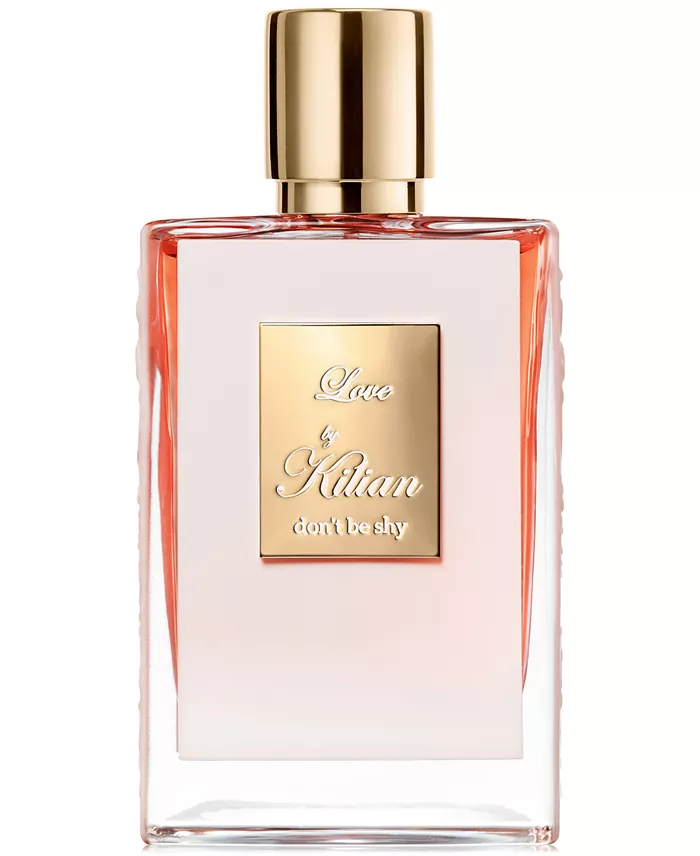 Kilian Love Don't Be Shy in its clear bottle inside the black clutch case
